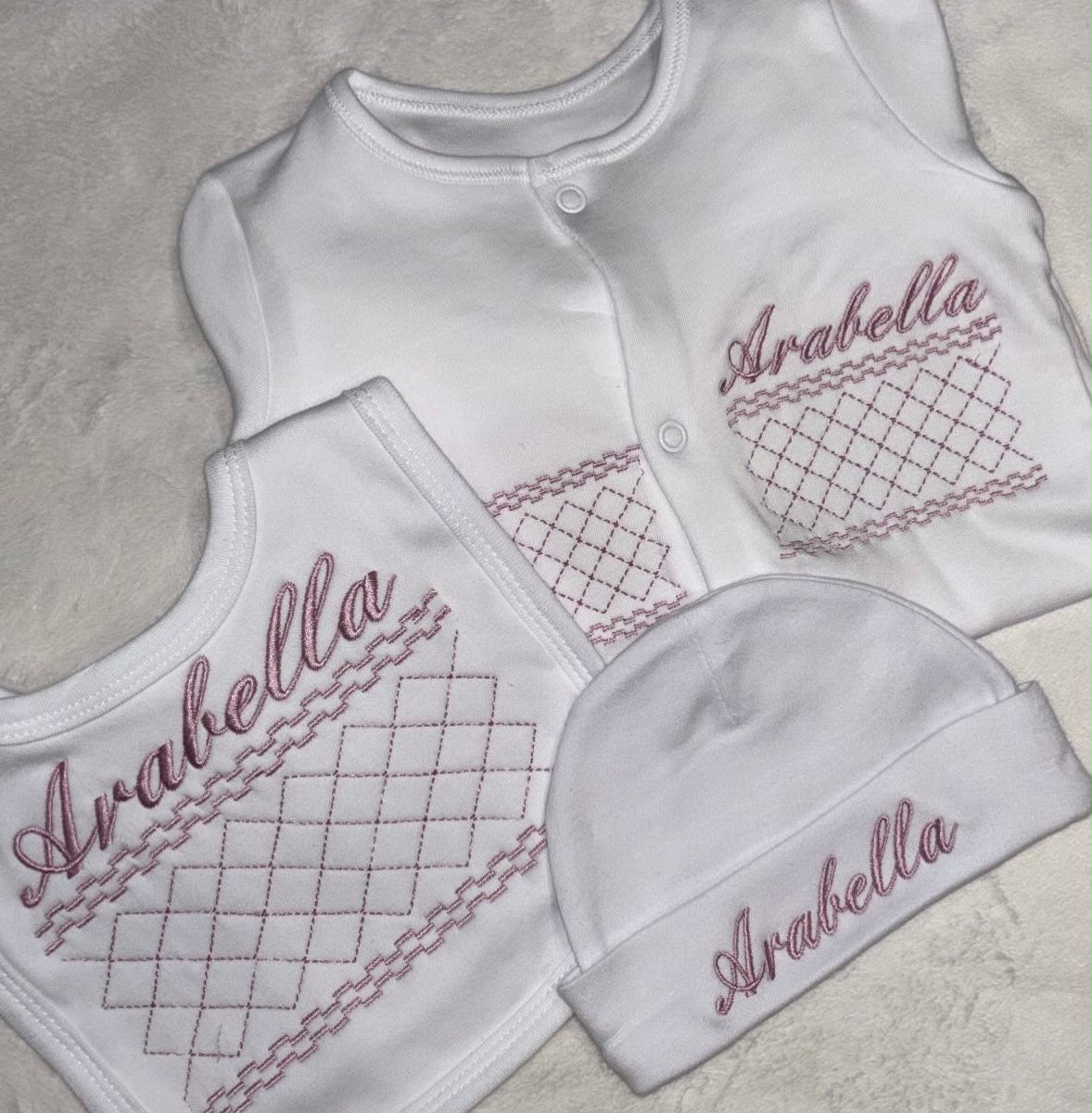 Babygrow hat and bib bundle